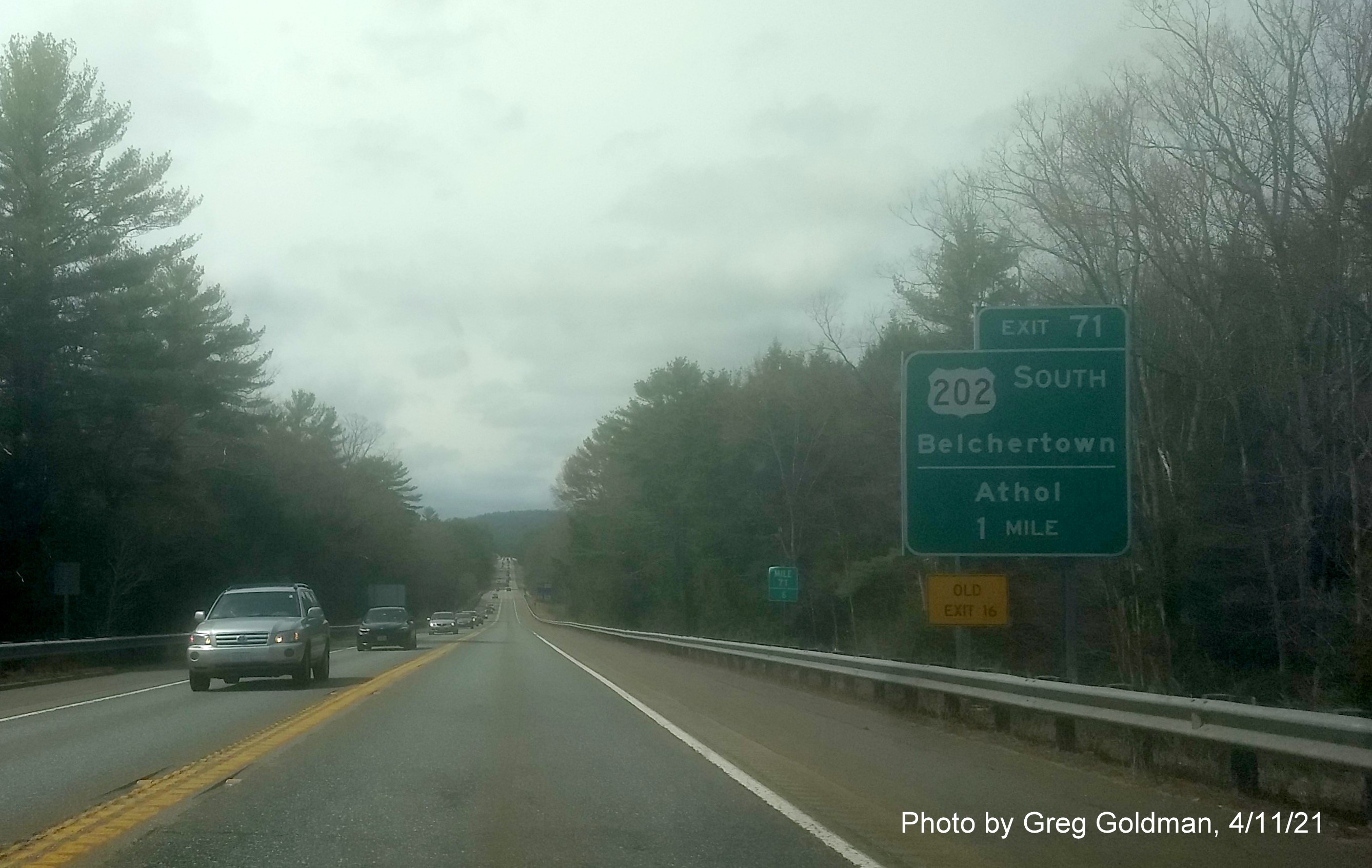Image of 1 Mile advance sign for US 202 South exit with new milepost based exit number and yellow Old Exit 16 sign on left support on MA 2 West in Athol, by Greg Goldman, April 2021