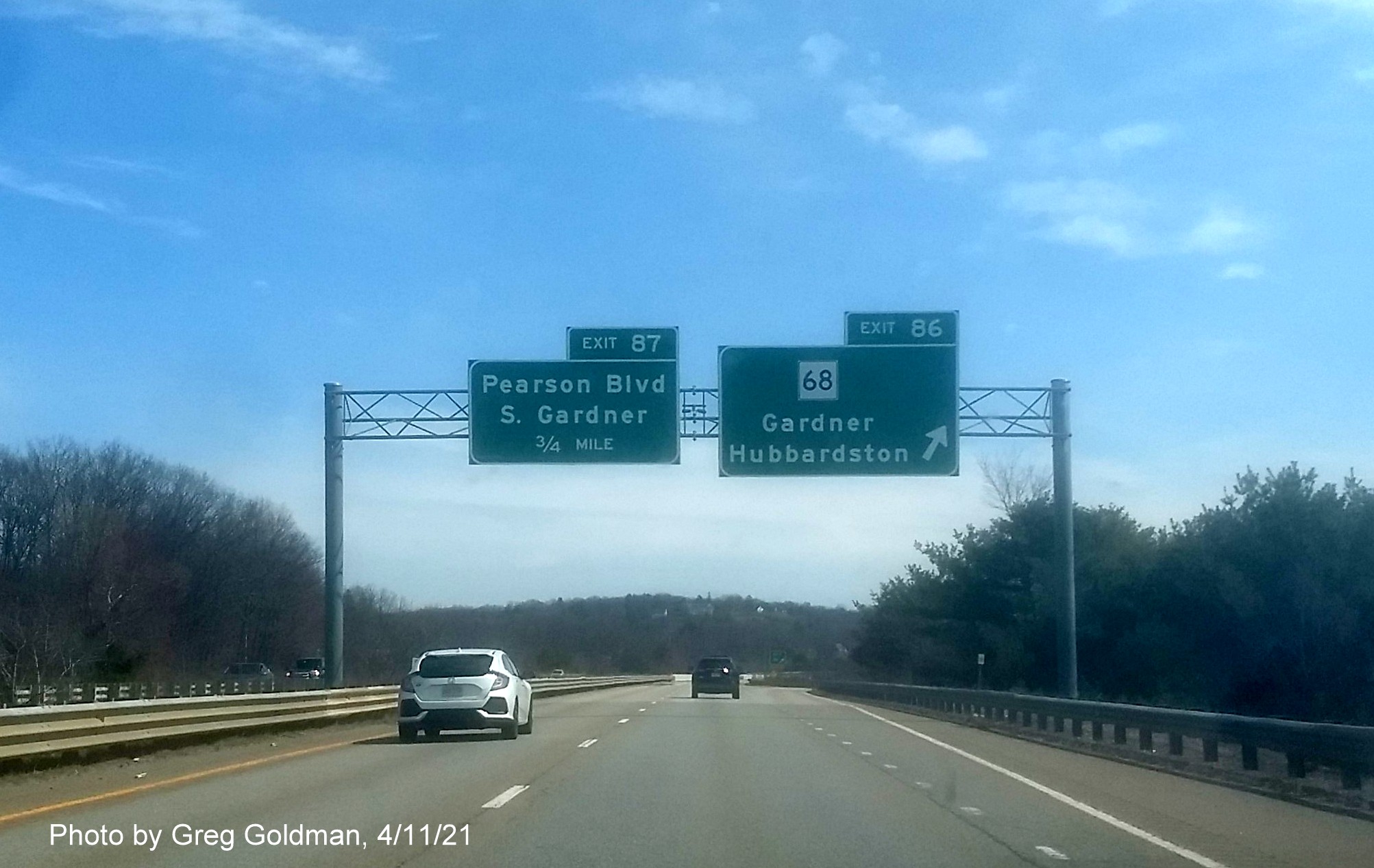 Image of overhead ramp sign for MA 68 Exit with new milepost based exit number on MA 2 East in Gardner, by Greg Goldman, April 2021