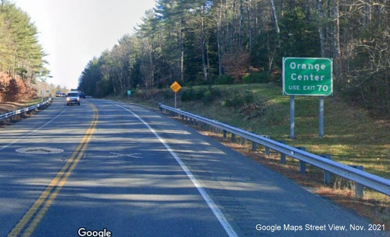Image of auxiliary sign for MA 122 exit with new milepost based exit number on MA 2 East in Orange, Google Maps Street View image, November 2021
