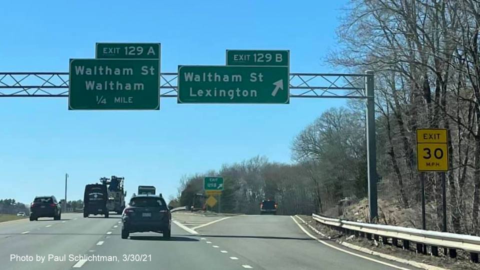 Image of overhead signs at Waltham Street Lexington exit with new milepost based exit numbers on MA 2 West in Lexington, by Paul Schlichtman, March 2021