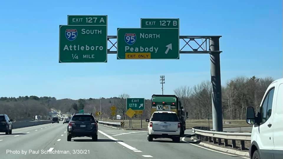 Image of overhead signage at ramp for I-95/MA 128 North exit with new milepost based exit numbers on MA 2 West in Lexington, by Paul Schlichtman, March 2021