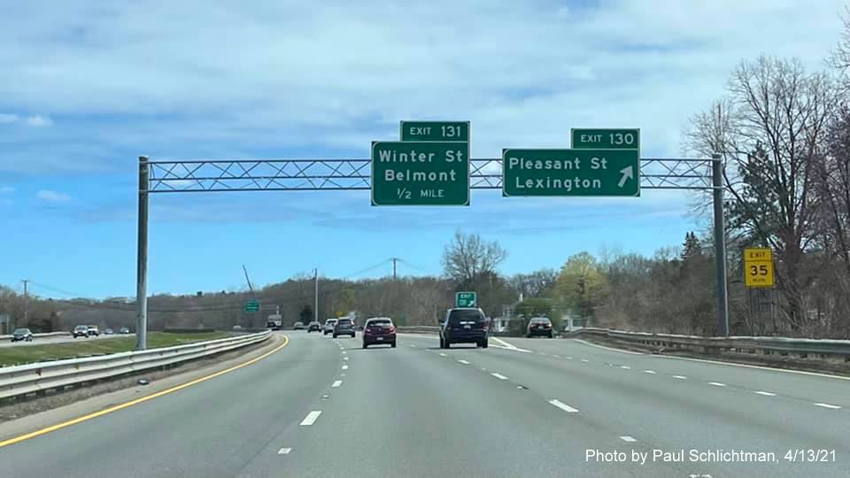 Image of overhead ramp sign for Pleasant Street exit with new milepost based exit number on MA 2 East in Lexington, by Paul Schlichtman, April 2021