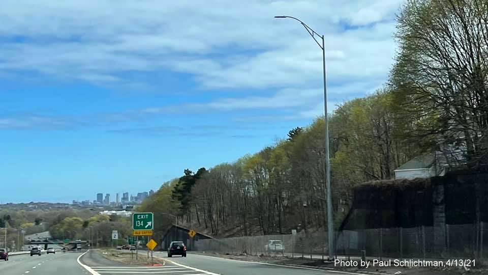 Image of gore sign for MA 60 exit with new milepost based exit number and yellow Old Exit 59 sign attached below on MA 2 East in Arlington, by Paul Schlichtman, April 2021 