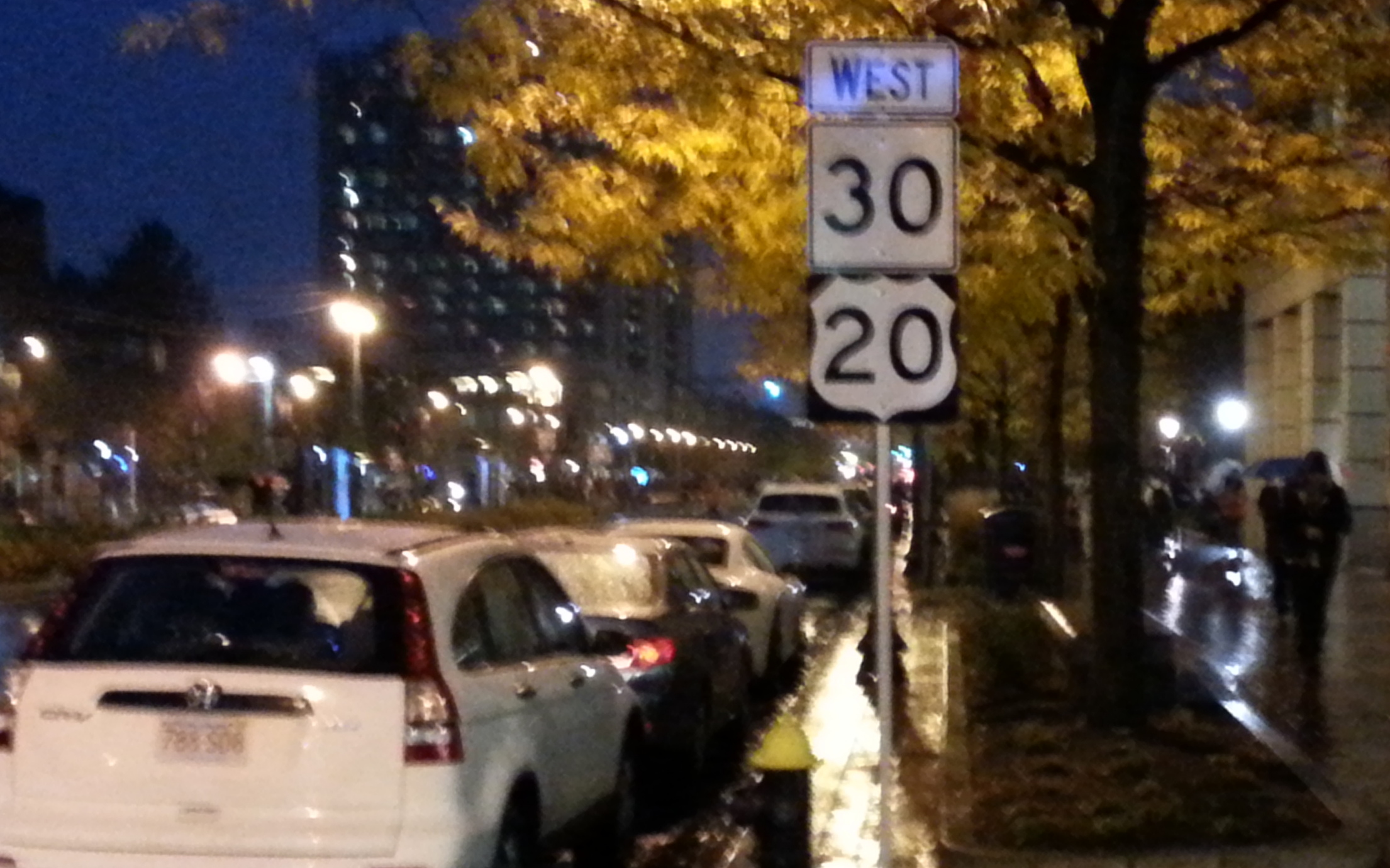 Photo of MA 30/US 20 sign along Comm Ave (in rain) near Kenmore Square in Boston