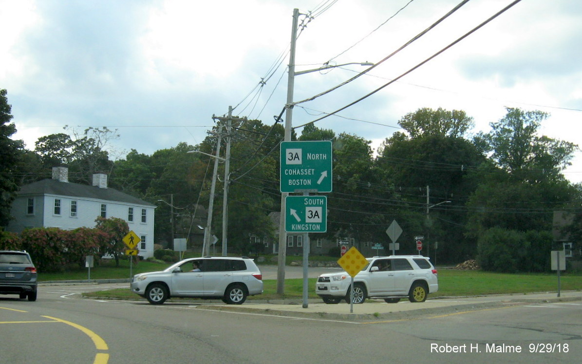 Image of guide signage at roundabout marking the intersection between MA 3A and MA 123 in Scituate