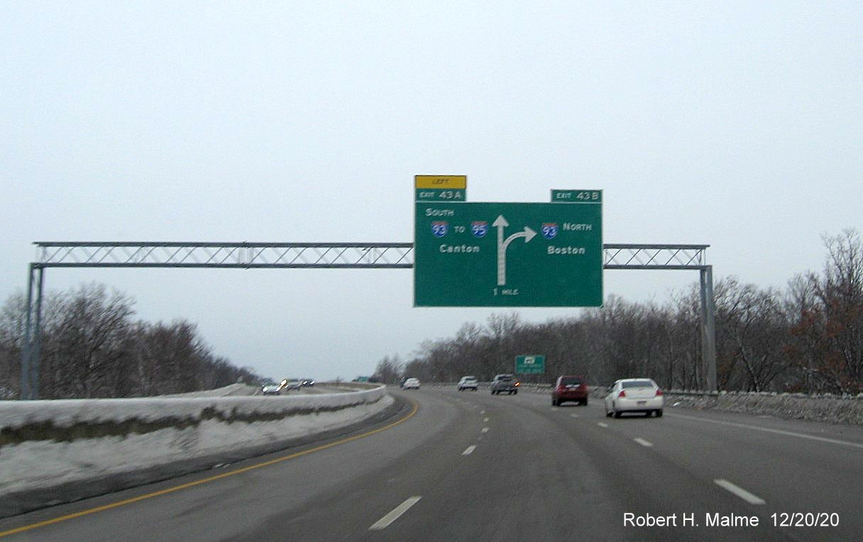 Imabe of 1-mile advance overhead diagrammatic sign for I-93 exits with new milepost based exit numbers on MA 3 North in Braintree, December 2020