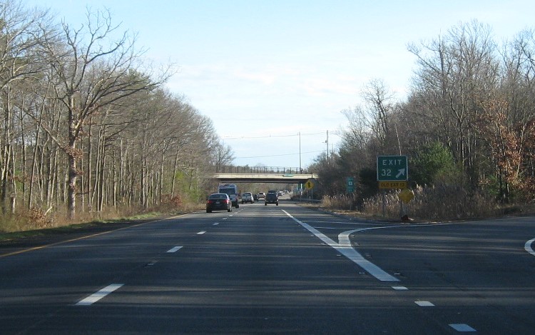 Image of gore sign for MA 53 123 exit with new milepost based exit number and yellow old exit number tab below on MA 3 South in Hanover, December 2020
