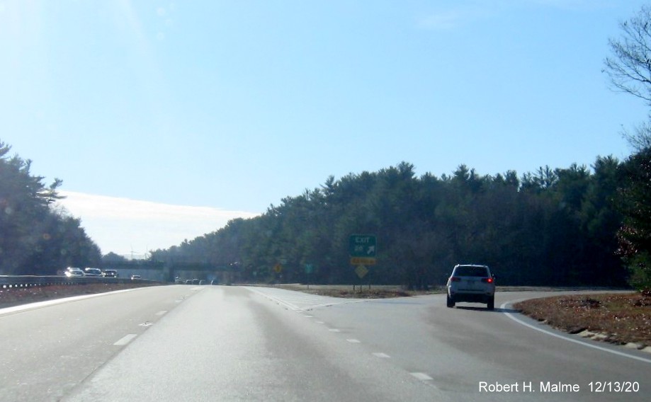 Image of the gore sign for MA 3A to MA 53 exit with (small) new milepost based exit number and yellow old exit number tab below on MA 3 South in Kingston, December 2020
