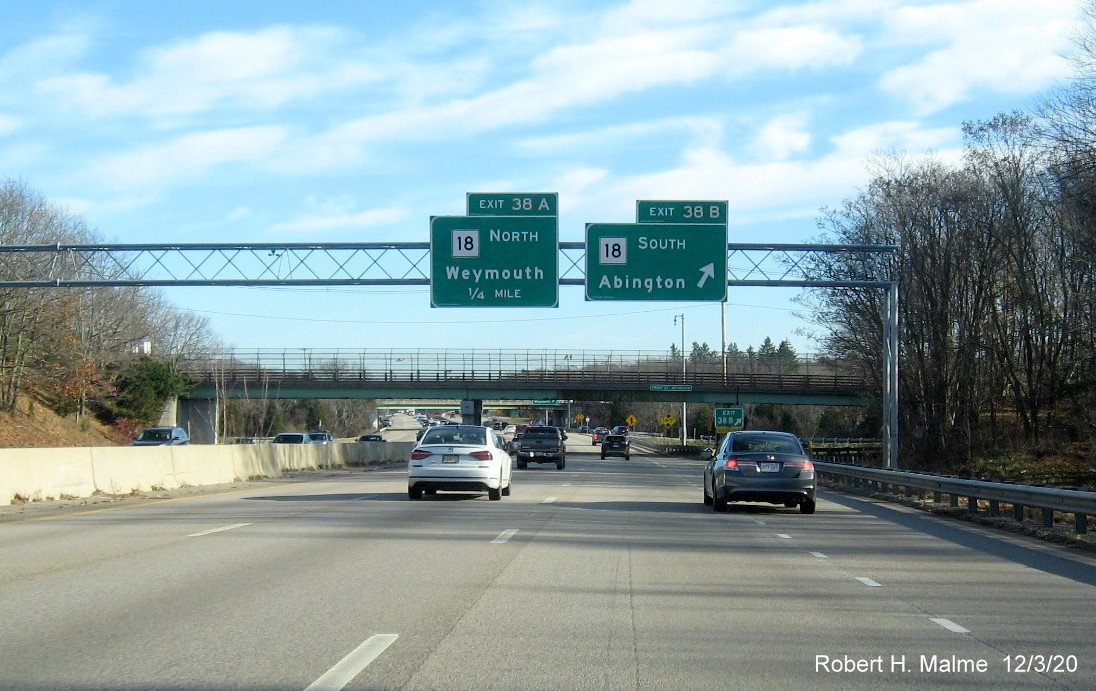 Image of overhead ramp signs at MA 18 South exit with new milepost based exit numbers on MA 3 South in Weymouth, December 2020