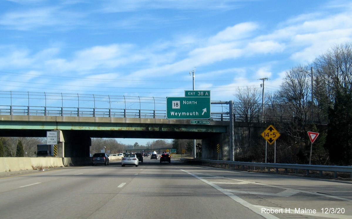 Image of overhead sign for MA 18 North exit ramp with new milepost based exit number on MA 3 South in Weymouth, December 2020