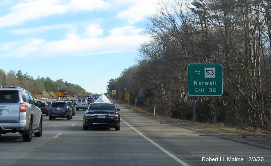 Image of auxiliary sign for Derby Street exit with new milepost based exit number on MA 3 South in Weymouth, December 2020