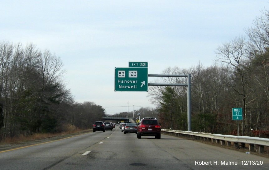 Image of overhead ramp sign for MA 53/123 exit with new milepost based exit number on MA 3 North in Hanover, December 2020