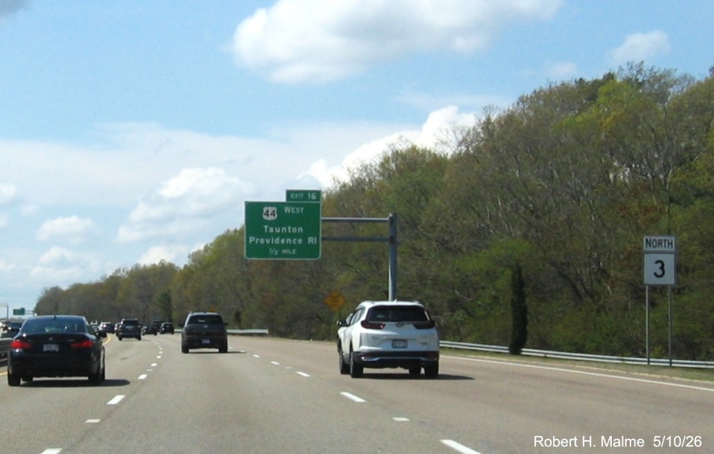 Image of new 1/2 mile advance sign for the US 44 West exit on MA 3 North in Plymouth, with
	North MA 3 (but no US 44 West) reassurance marker beforehand, May 2026