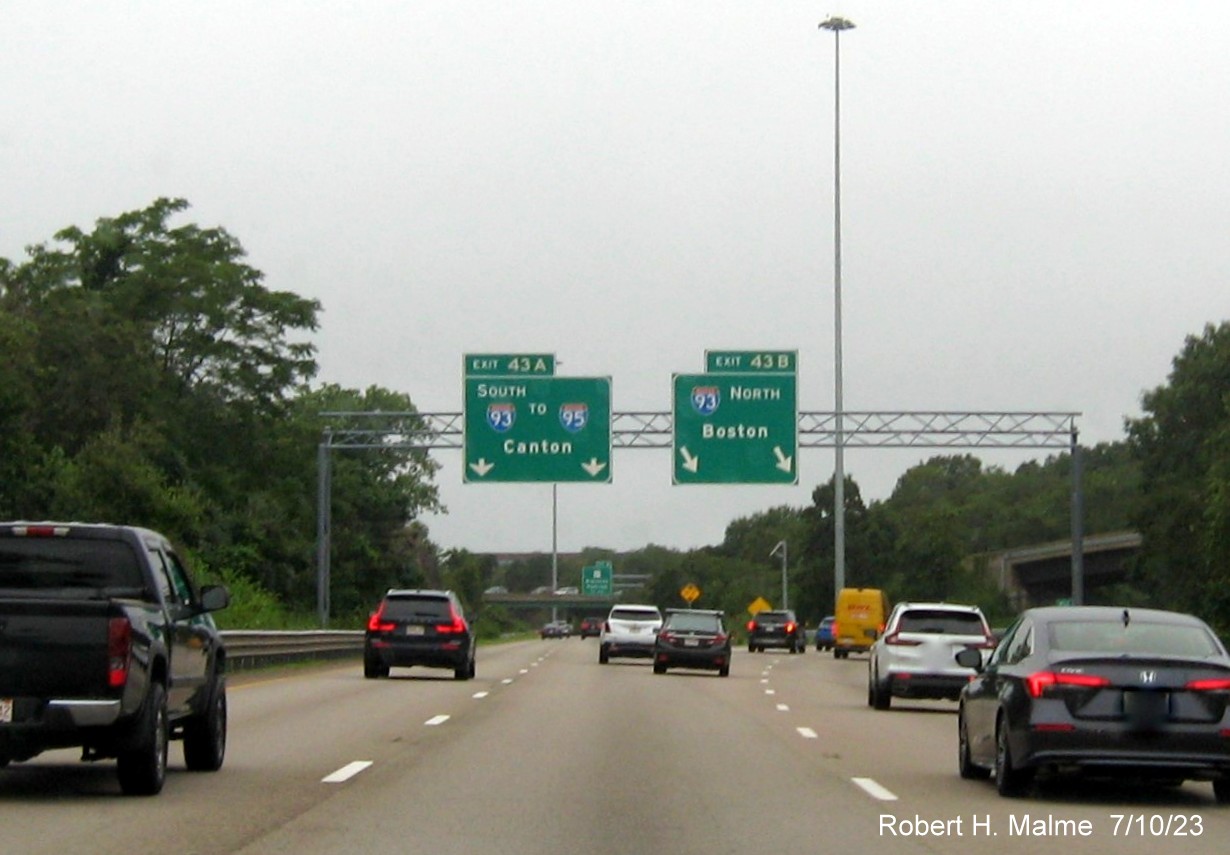  Image of 1 mile advance overhead diagrammatic sign for I-93 exits with yellow Old Exit tab removed from left exit tab on MA 3 North in Braintree, July 2023
