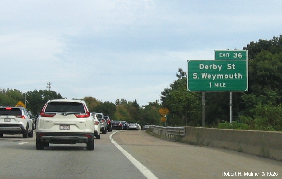 Image of new ground mounted 1 mile advance sign for the Derby Street exit on MA 3 South in 
	Weymouth, September 2026