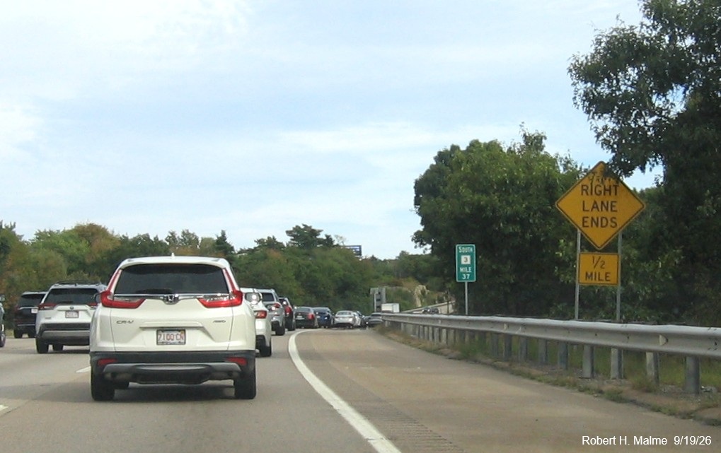 Image of new Right Lane End in 1/2 mile warning sign and Mile 37 marker on MA 3 South in 
	Weymouth, September 2026