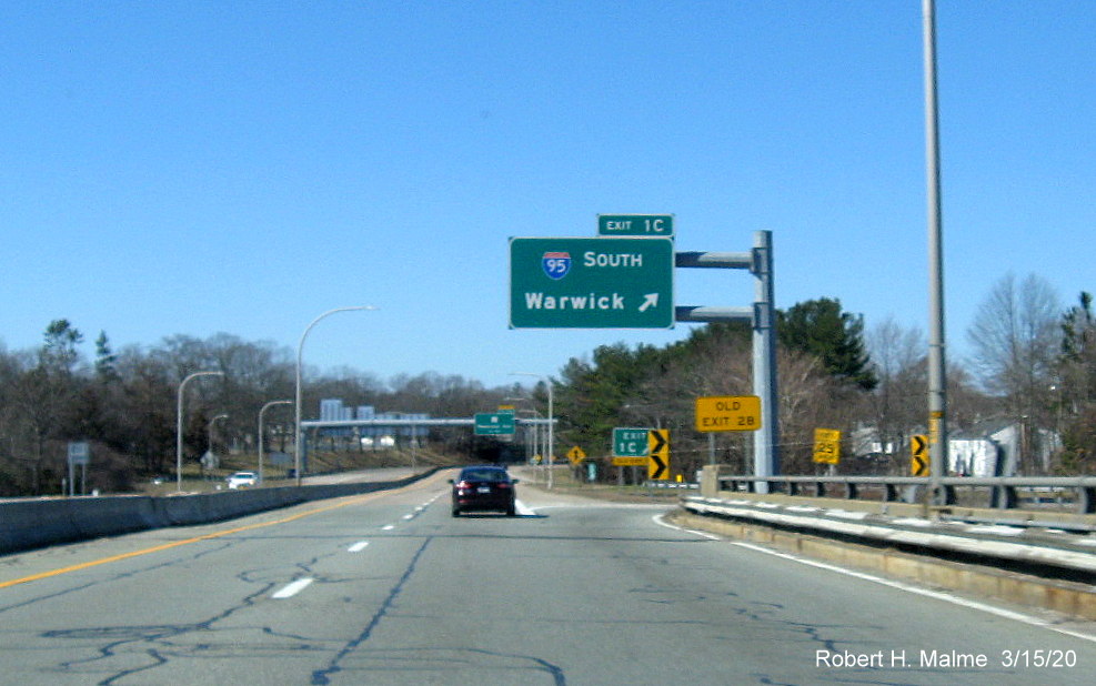 Image of overhead exit sign for I-95 South exit on RI 10 North in Providence with new exit number and old exit number tab taken in March 2020