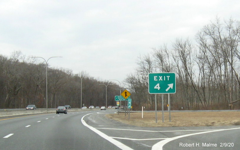 Image of new milepost based exit number gore sign for the Twin River Road exit on RI 146 North in Lincoln