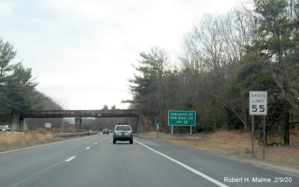 Image of ground mounted auxiliary sign with new milepost based number for Pound Hill Road exit on RI 146 South in North Smithfield