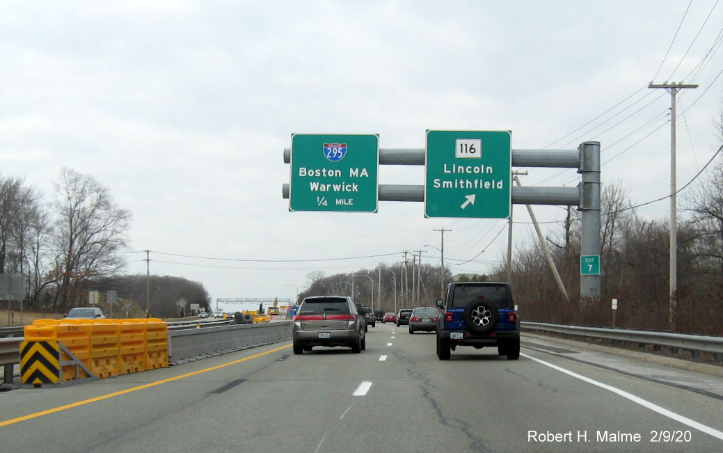 Image of new Exit 6 sign attached to support of RI 116 ramp sign on RI 146 North in Lincoln
