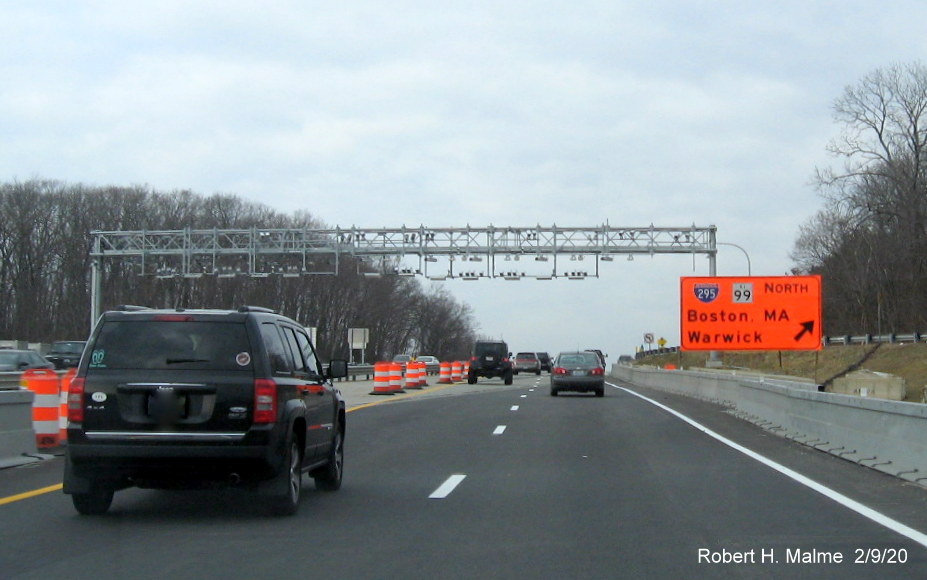 Image of temporar I-295/RI 99 exit sign in construction zone for new truck toll gantry on RI 146 North in Lincoln