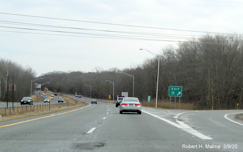 Image of recently placed new milepost based number gore sign for RI 104 exit on RI 146 South in North Smithfield