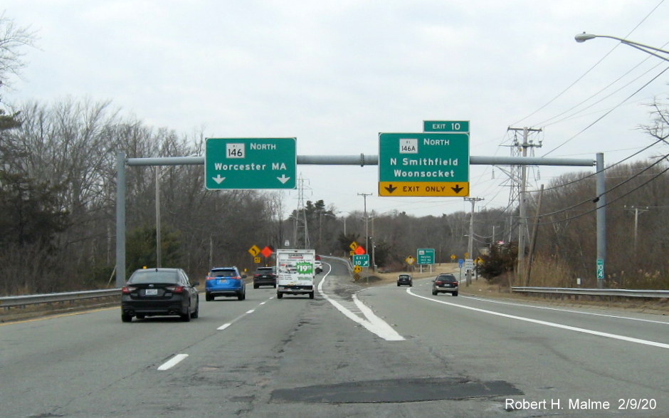 Image of new overhead signage with milepost based exit number for RI 146A North exit on RI 146 North in North Smithfield