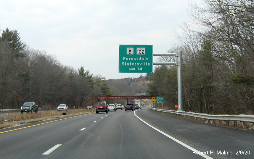 image of recently placed overhead auxiliary sign with new milepost based number for RI 146A exit on RI 146 North in North Smithfield
