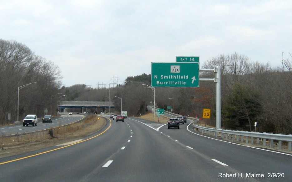image of recently placed overhead ramp sign with new milepost based exit number for RI 146A exit on RI 146 North in North Smithfield