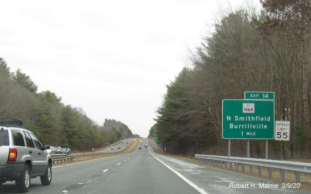 Image of ground mounted 1-Mile advance sign with new milepost based exit number for RI 146A exit on RI 146 South in North Smithfield