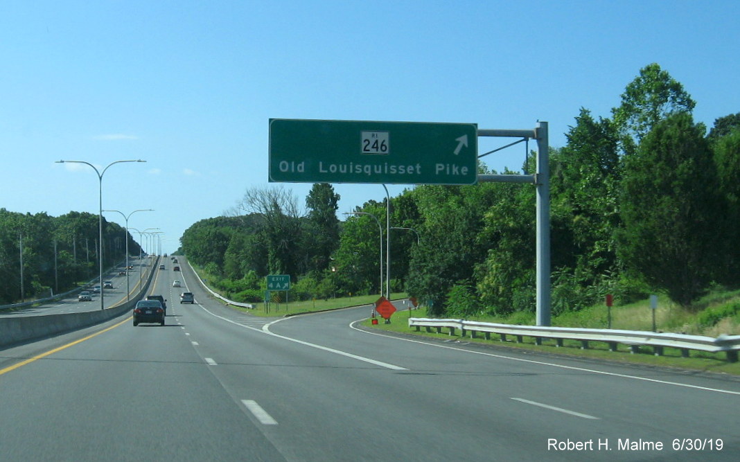 Image of new exit number gore sign and exit ramp overhead sign for RI 246 exit on RI 146 South in Lincoln