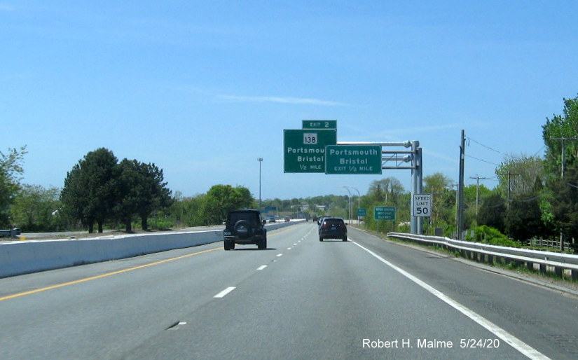 Image of newly placed 1/2 mile advance overhead sign for RI 138 South exit on RI 24 South in Portsmouth, taken in May 2020