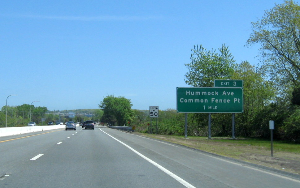 Image of new ground mounted 1-mile advance sign for Hummock Avenue exit on RI 24/138 North in Portsmouth