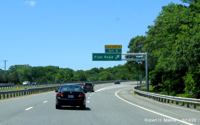 Image of newly placed overhead ramp sign for Fish Road exit with new exit number and yellow old exit number tab on RI 24 South in Tiverton, taken June 2020