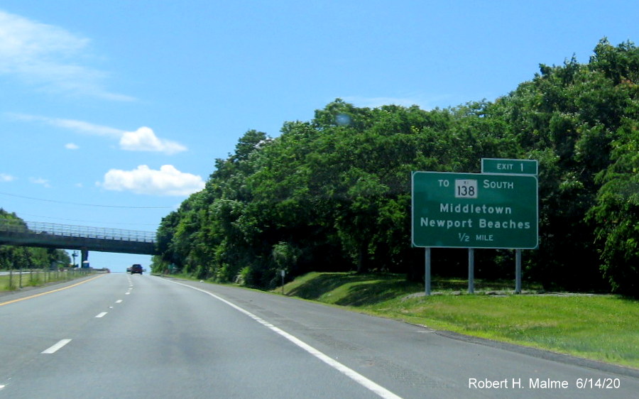 Image of recently placed 1/2 mile advance sign for To RI 138 exit on RI 24 South in Portsmouth, taken June 2020 e