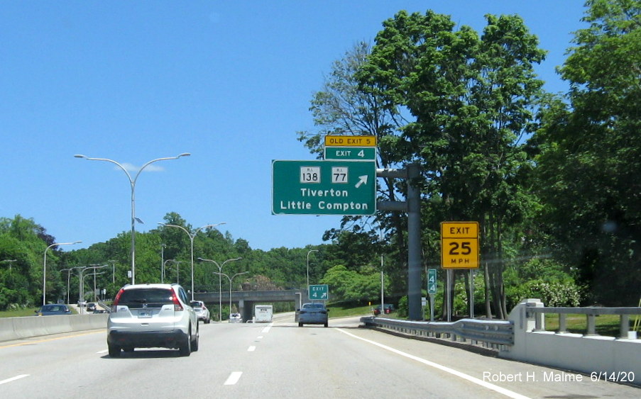 Image of existing overhead ramp sign for RI 77/RI 138 exit with new exit number and yellow old exit number tab on RI 24 North in Tiverton, taken June 2020