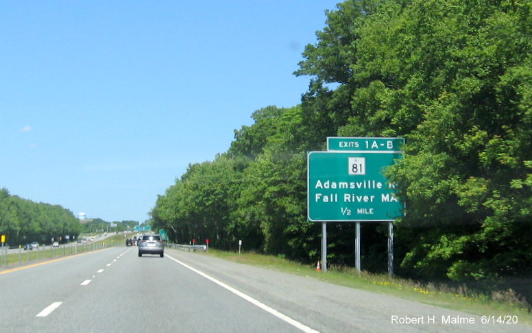 Image of newly placed 1/2 mile advance ground mounted sign for MA 81 exit, with RI 81 shield, on RI 24 North in Tiverton, taken June 2020