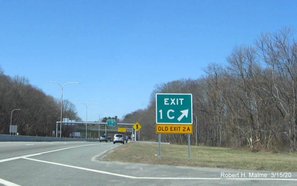 Image of new exit number gore sign with yellow old exit number tab below for RI 2 South exit on RI 37 West in Cranston, taken in March 2020
