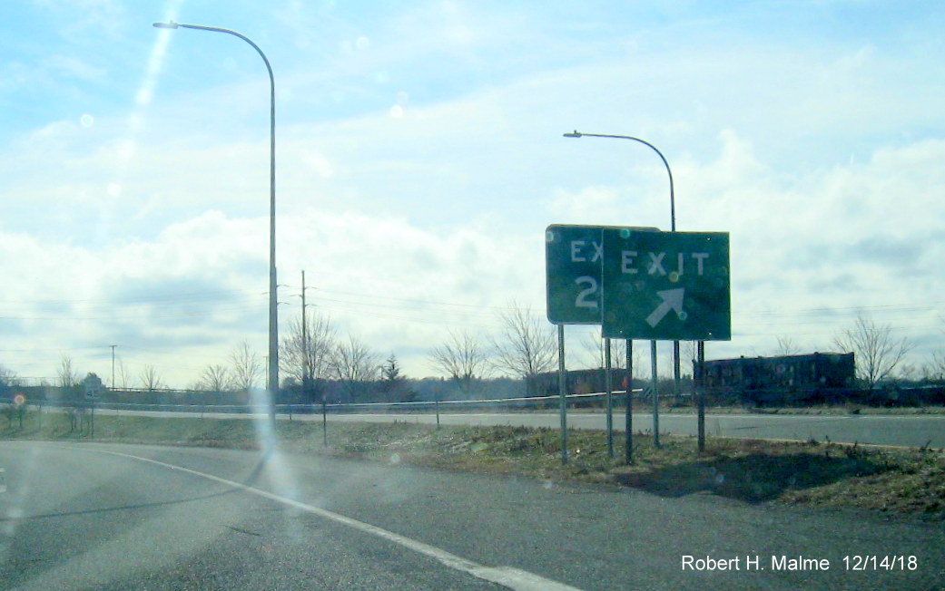 Image of newly installed Exit 2 gore sign behind to be removed old exit sign at W. Davisville Rd exit on RI 403 East in Greenwich