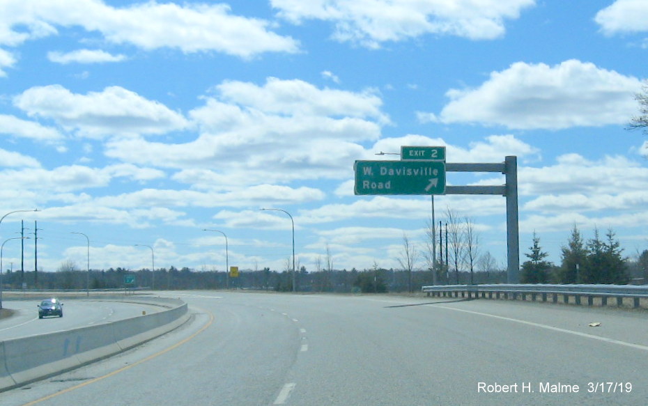 Image of new exit number tab on top of existing overhead ramp sign for West Davisville Road exit on RI 403 East in Davisville