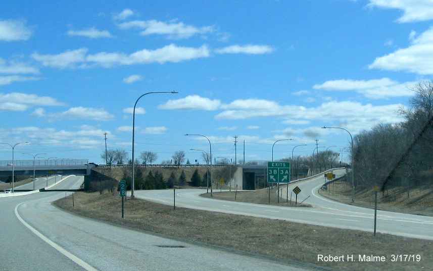 Image showing a closer view of new exit signage at split of ramps to US 1 and Davisville Road with new exit numbers on RI 403 East in Davisville