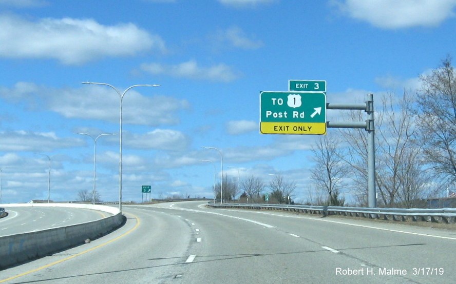 Image of existing overhead ramp sign with new exit number tab for To US 1 exit on RI 403 West in Davisville