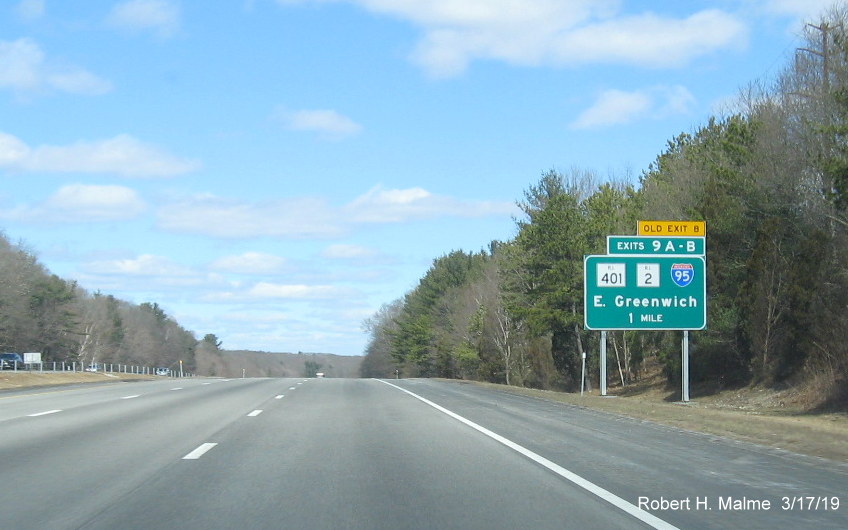 Image of new 1-mile advance sign with new exit number and old exit number tab for RI 401/RI 2/ I-95 (North) exit on RI 4 North in East Greenwich