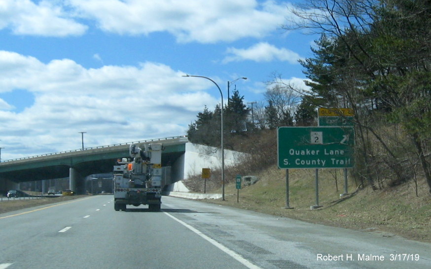 Image of new ramp sign with new exit number and old exit number tab for RI 2 exit on RI 4 South in East Greenwich
