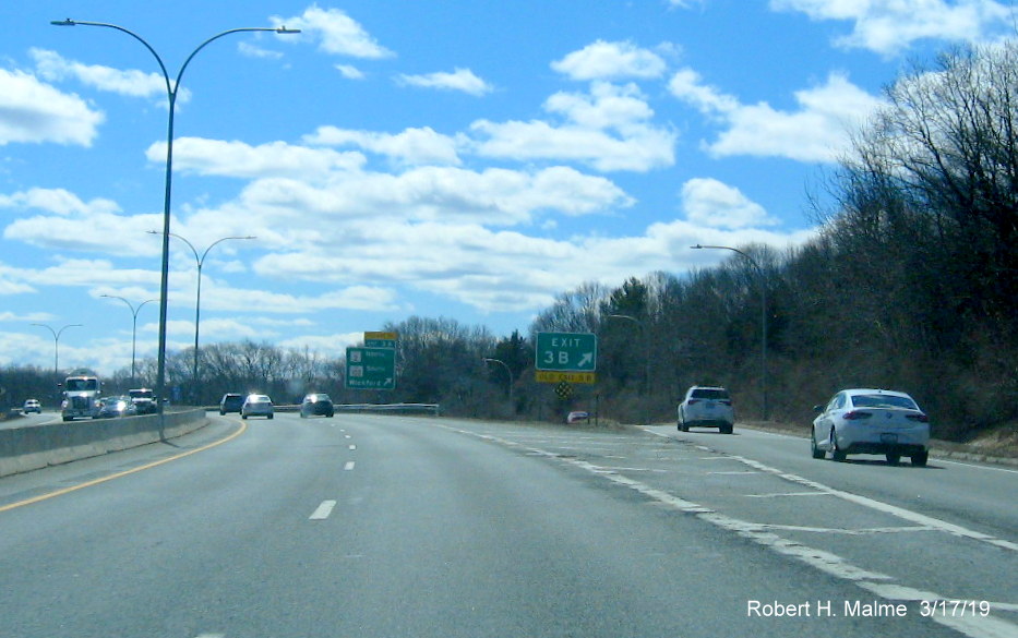 Image of new exit gore sign for RI 2 South, RI 102 West exit on RI 4 South in Exeter