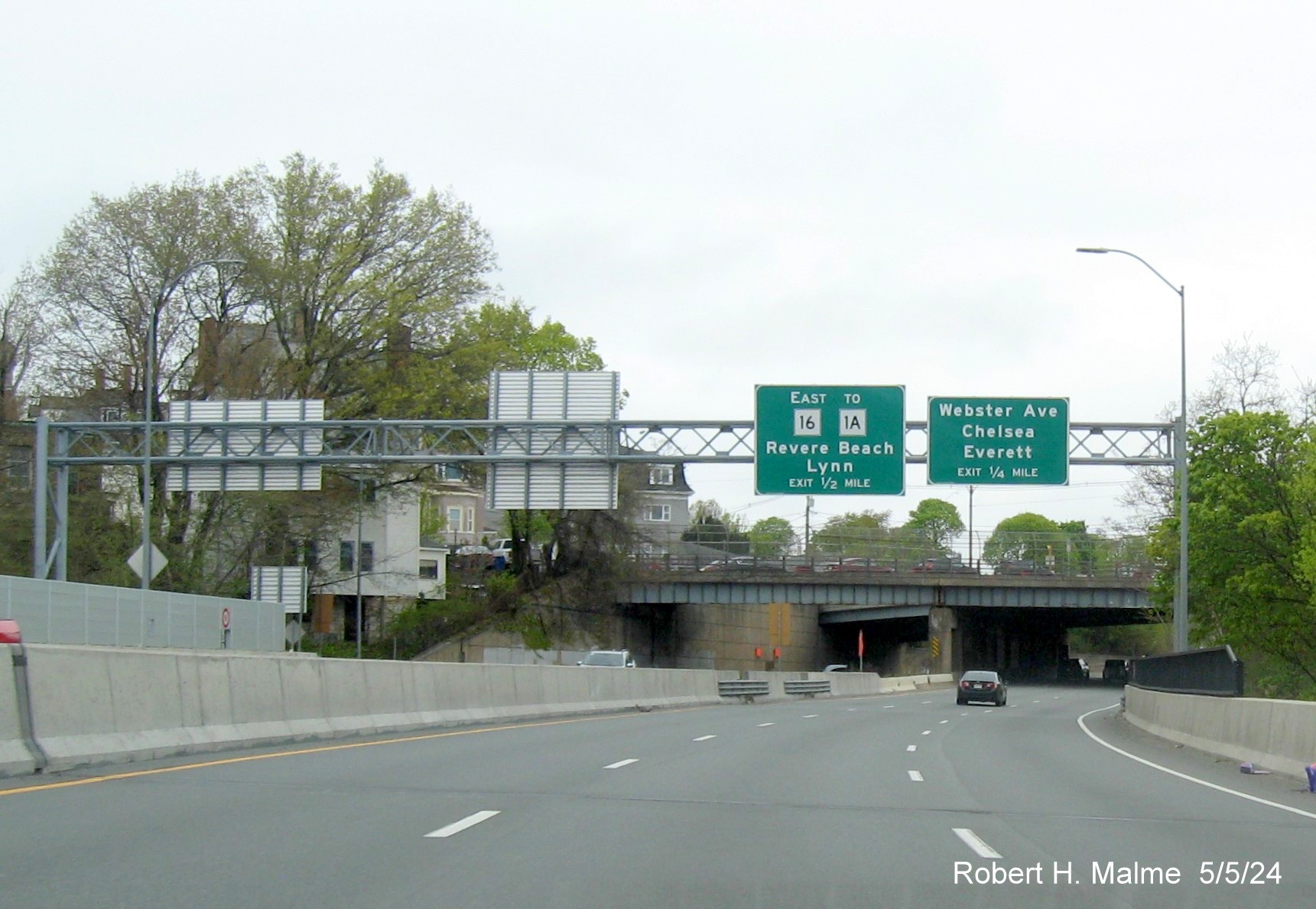 Overhead signage for MA 16 and Webster Avenue exits on US 1 North in Chelsea, May 2024