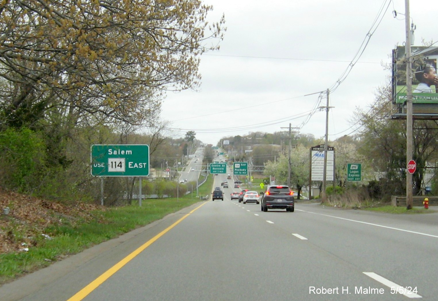 Image of recently placed left side ground mounted auxiliary sign for MA 114 East exit on US 1 North in Peabody, May 2024