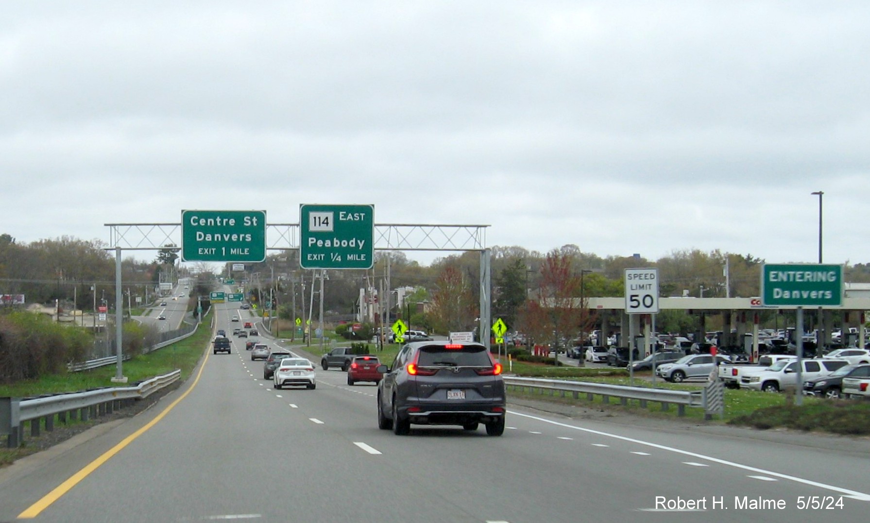 Image of recently placed overhead signs for MA 114 and Centre Street exits on US 1 North in Danvers, May 2024