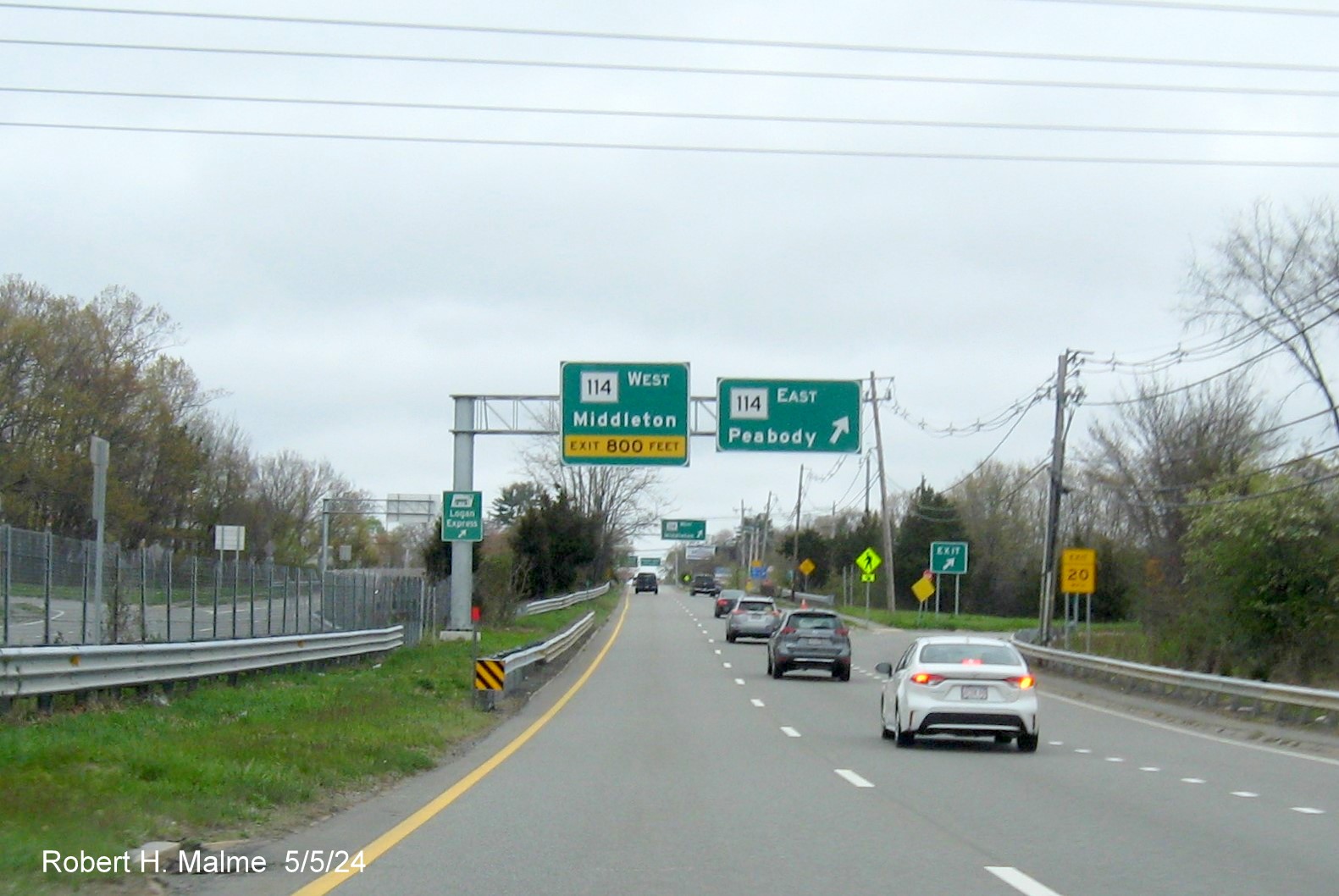 Image of recently placed overhead signs at the ramp for MA 114 East on US 1 North in Danvers, May 2024