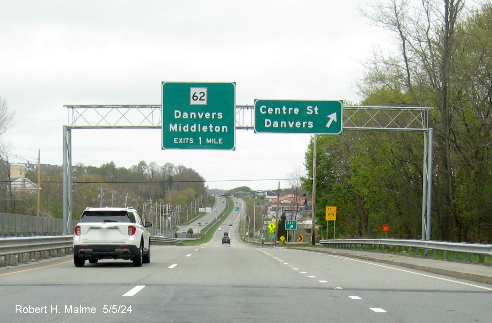 Image of recently placed overhead signs for MA 62 and Centre Street exits on US 1 North in Danvers, May 2024